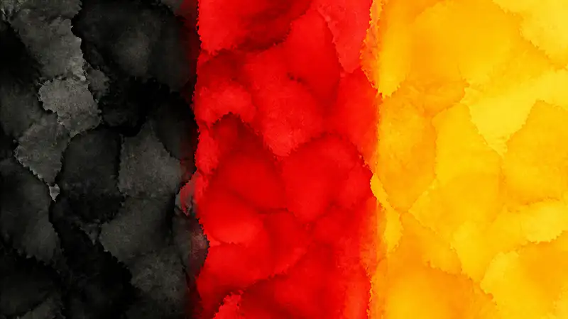 Abstract watercolor in German flag colors, with vertical black, red, and gold pigment fields
